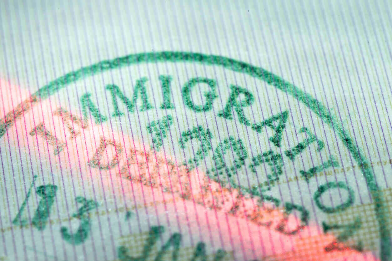 Close-up of an immigration passport stamp symbolizing the complexities of U visa application denials.
